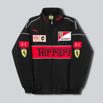 Black Ferrari jacket with Ferrari logos and branding on a gray background