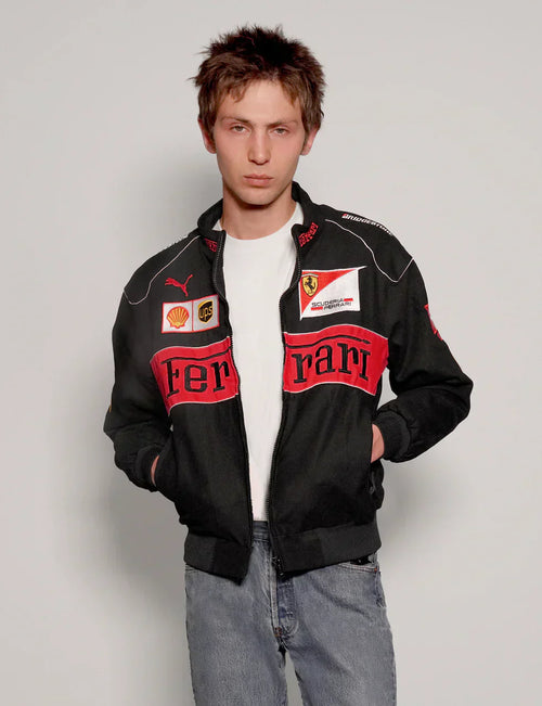 Front view of model wearing a streetwear Black Ferrari Racing Jacket with a relaxed fit