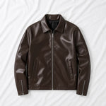 Brown leather jacket on a white background