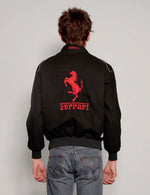Back design showing the structured drape of the oversized y2k black ferrari jacket