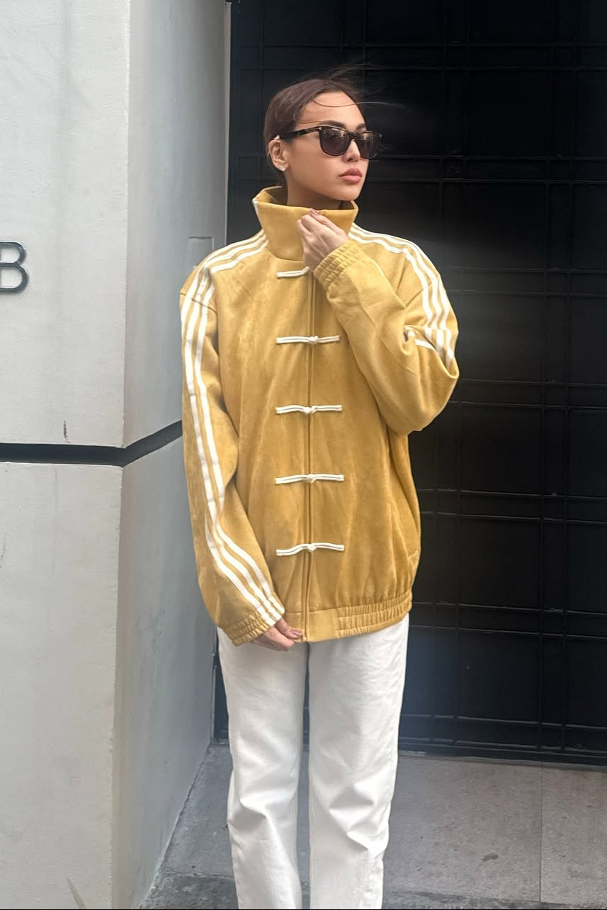 Woman wearing Northly CNY Yellow Jacket – Chinese New Year Inspired Mustard Street Style Jacket