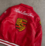Close-up of racing patches on red motorsport Porsche leather jacket for men