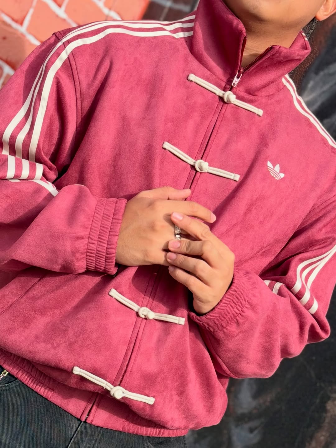 Close-up of high-density 380 GSM fabric on the y2k aesthetic lightweight crimson red cny jacket