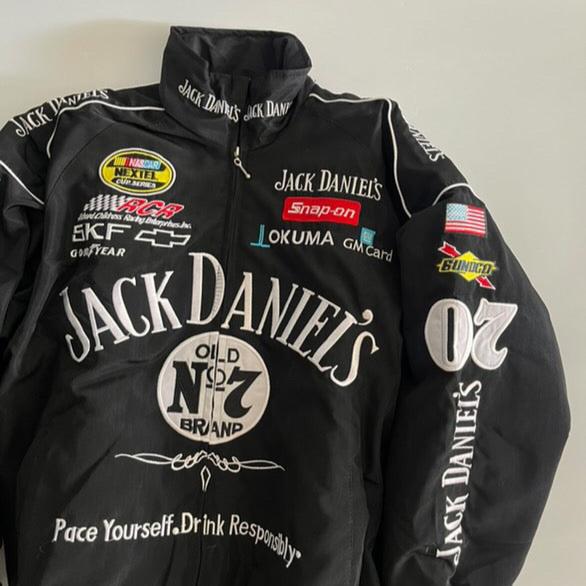 Black jack daniels racing jacket with multiple brand logos on a light gray background