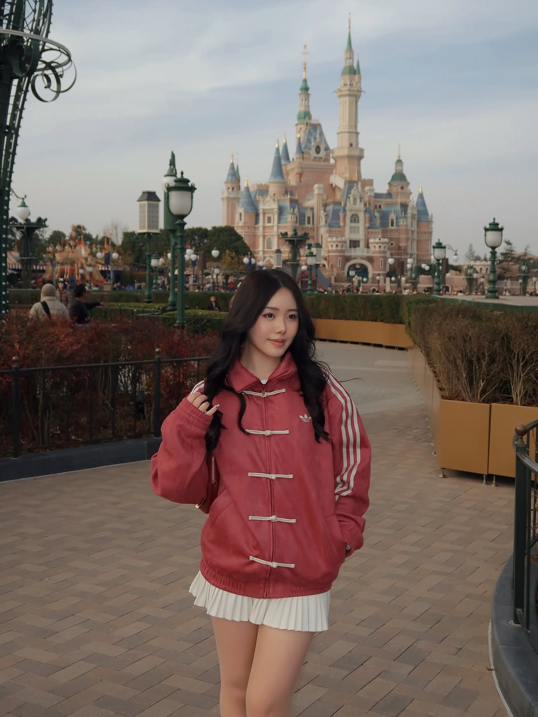 Premium festive streetwear layering jacket for women worn over a crop top